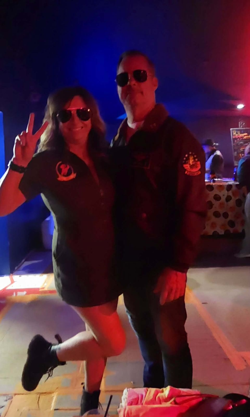 A couple in sunglasses at the bar