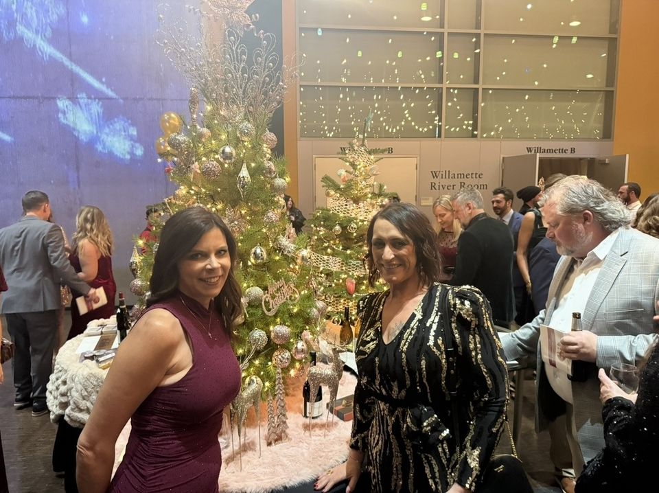 The Pink Elephant crew dressed up for a holiday gala