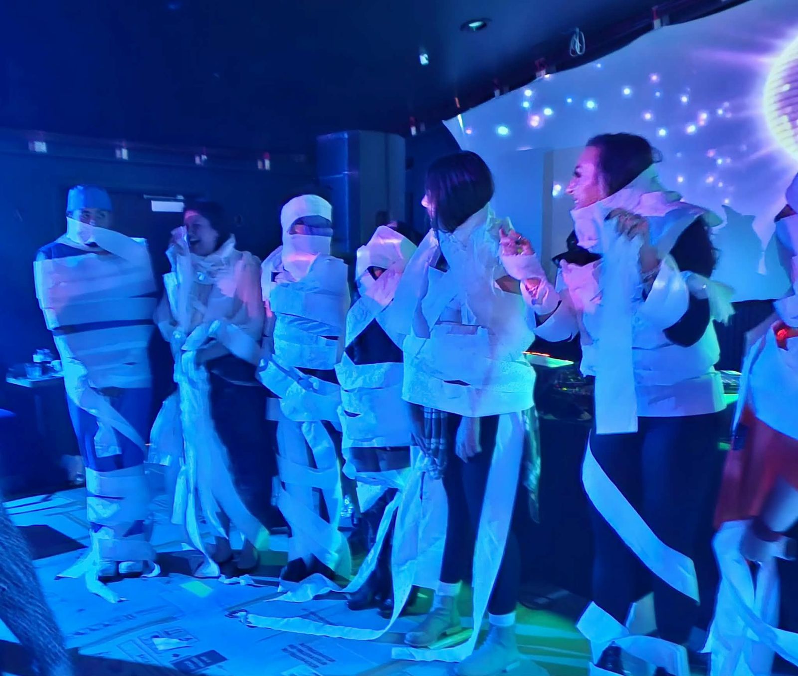 Mummy wrap contest at a Pink Elephant party