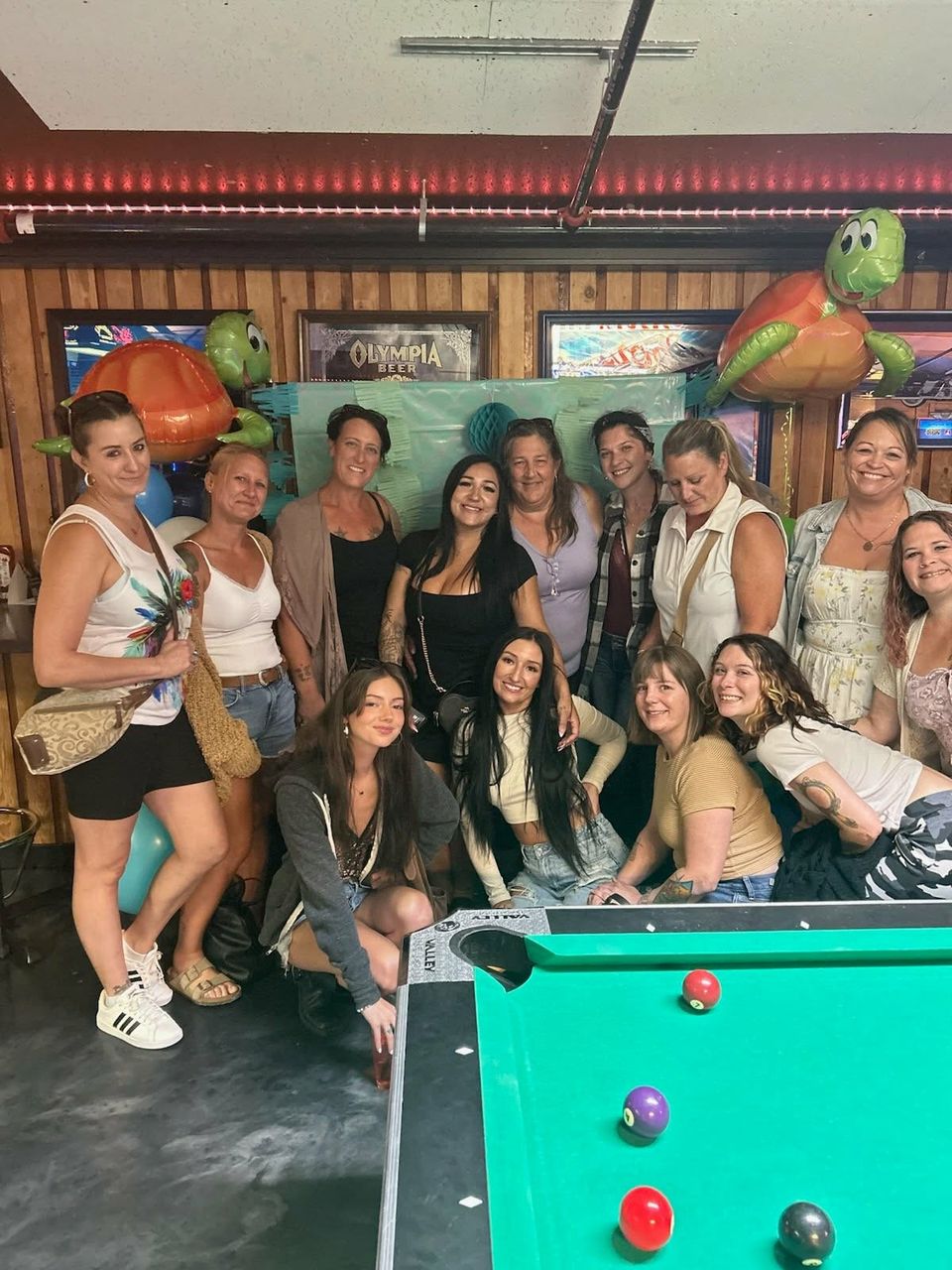 Tropical themed party by the pool tables